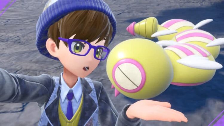 Mostra con orgoglio il suo 1/68.300 di probabilità di cattura in Pokémon Scarlatto e Viola